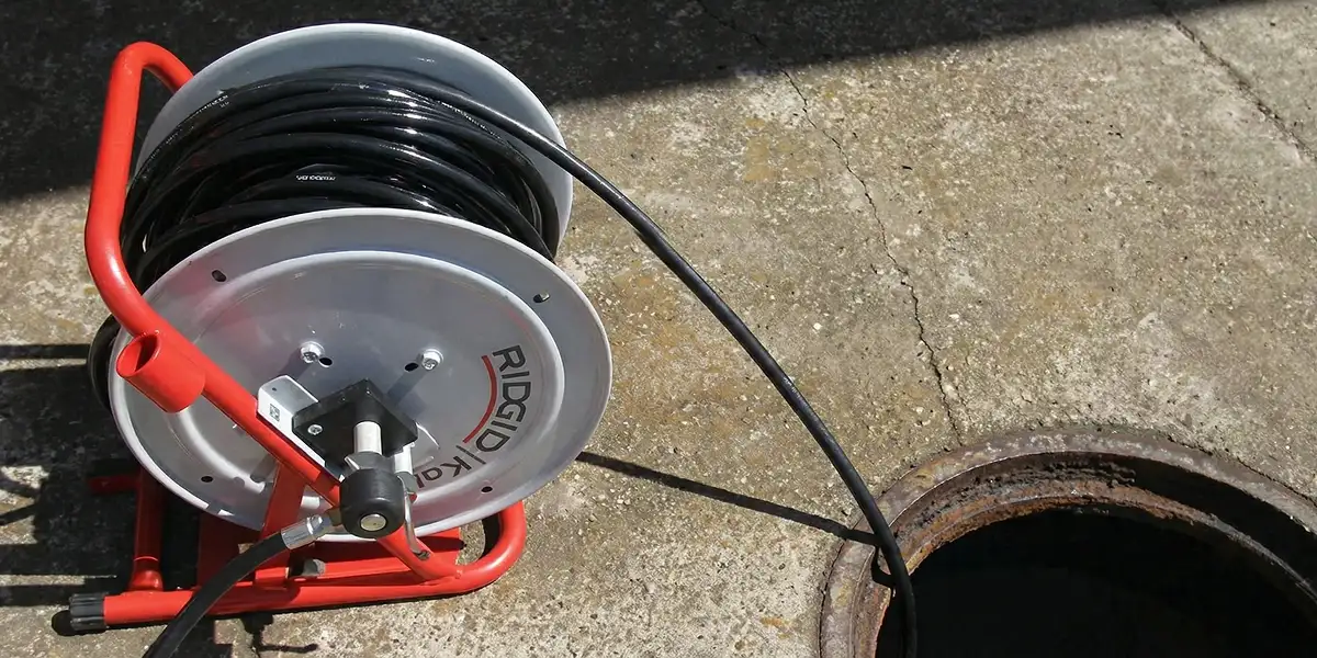 sewer rodding equipment prepared to clear clogged sewer lines in Savannah, GA